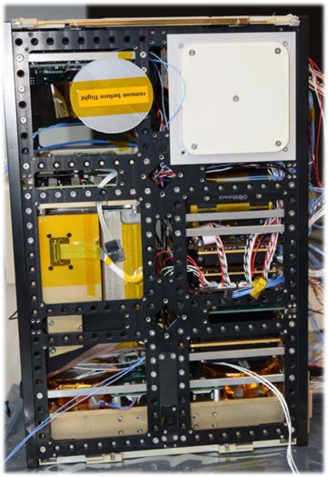 GOMX-4 CubeSat during assembly and inspection.